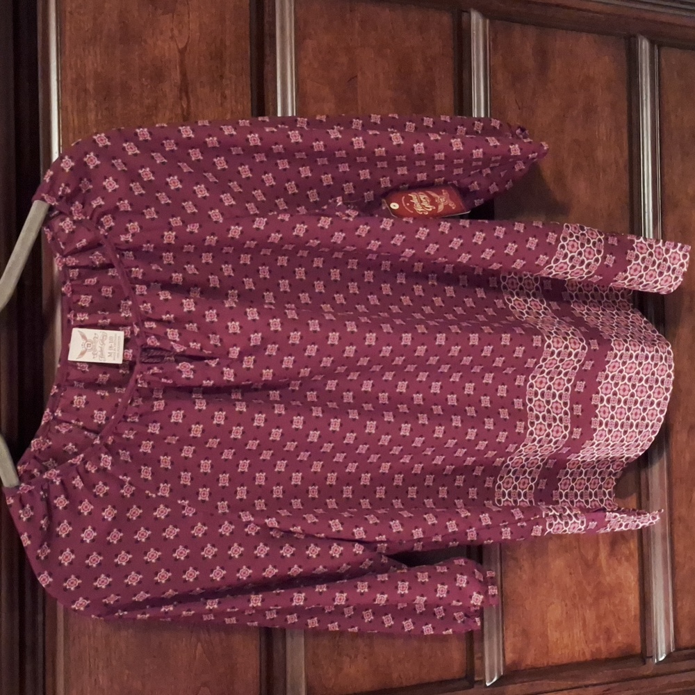 Brand new long sleeve blouse. Burgundy, print.